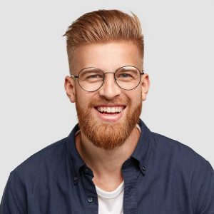 pleased cheerful redhaired male with pleasant smil CCXAYZL 1